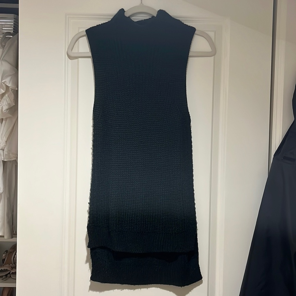 Black sleeveless turtleneck
